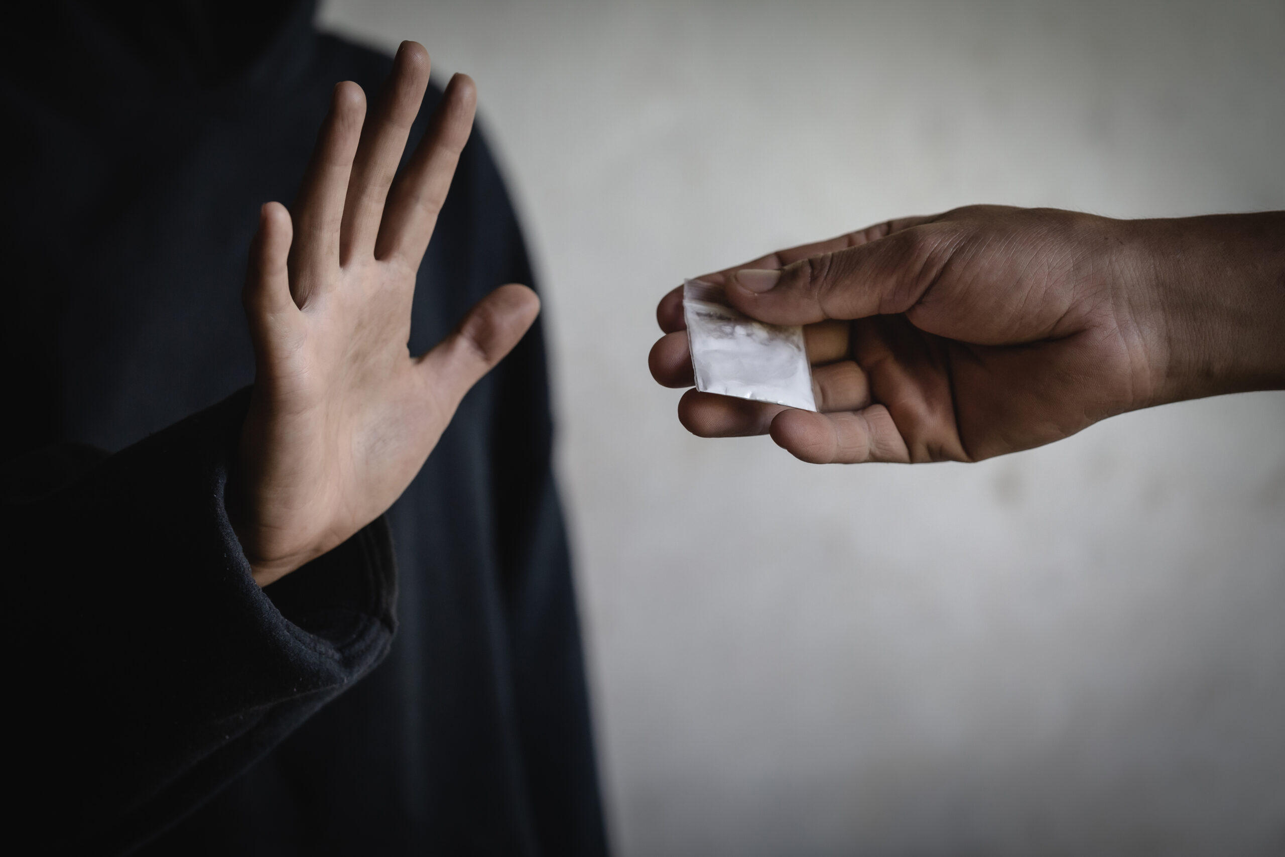 A Woman Making A Stop Gesture To Drugs